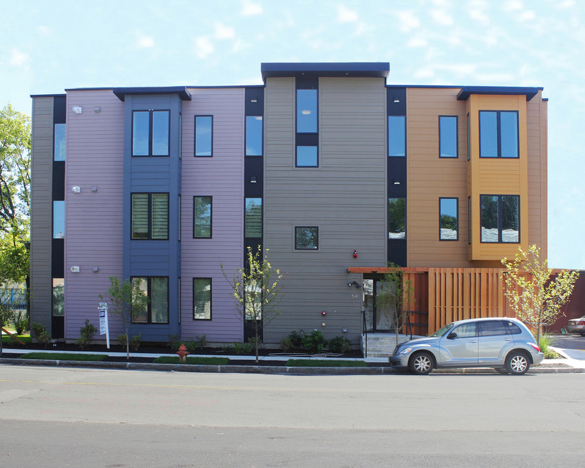 Multi Colored Commercial Apartment Complex with professional installment and replacement of fiber Cement Siding